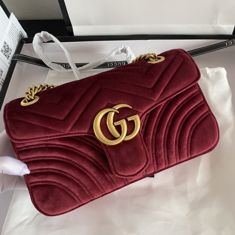G*u*i clutch bags